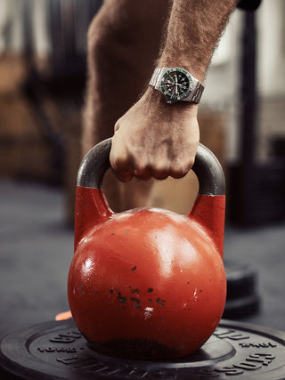 Angle shot of Luminox XS.0937 Green Dial Silver Stainless Steel Unisex Watch on white background