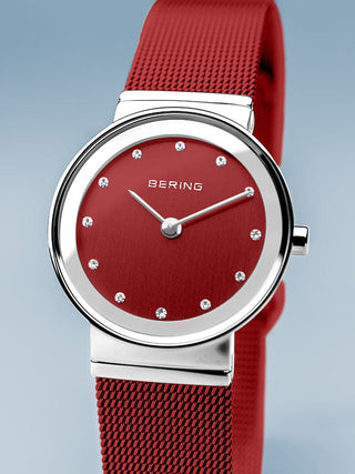 Angle shot of Bering 10126-303 Red Dial Stainless Steel Womens Watch on white background