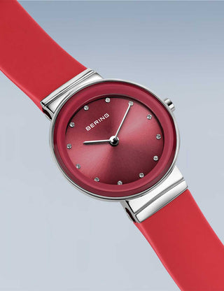 Angle shot of Bering 10129-503 Red Dial Silicone Womens Watch on white background