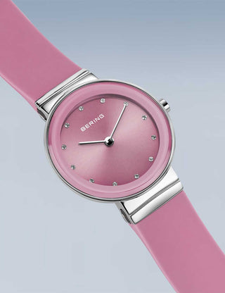 Angle shot of Bering 10129-909 Pink Silicone Womens Watch on white background