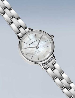 Angle shot of Bering 11022-704 Mother Of Pearl Dial Silver Stainless Steel Womens Watch on white background