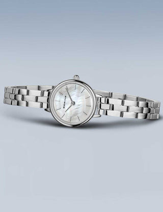 Angle shot of Bering 11022-704 Mother Of Pearl Dial Silver Stainless Steel Womens Watch on white background