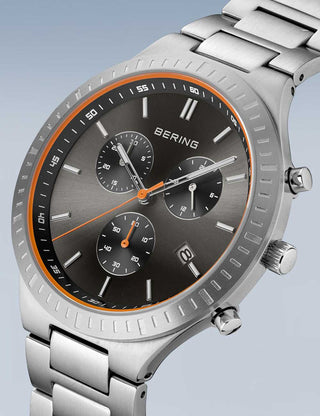 Angle shot of Bering Chronograph 11743-709 Grey Dial Silver Titanium Unisex Watch on white background