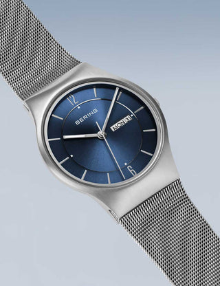 Angle shot of Bering 11938-003DD Blue Dial Silver Stainless Steel Unisex Watch on white background