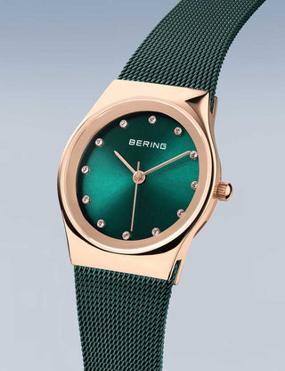 Angle shot of Bering 12927-868 Green Stainless Steel Womens Watch on white background