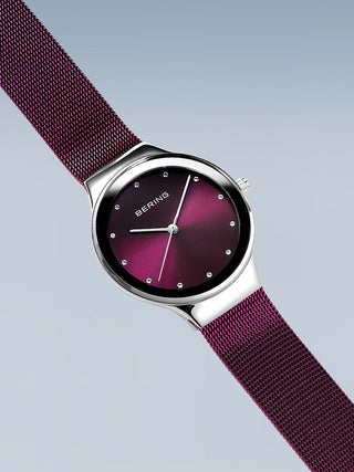 Angle shot of Bering 12934-909 Purple Stainless Steel Womens Watch on white background