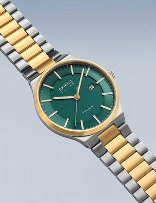 Angle shot of Bering 14439-718 Green Dial Gold Titanium Unisex Watch on white background