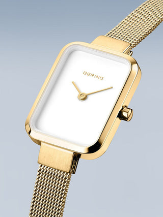 Angle shot of Bering 14520-334 White Dial Gold Stainless Steel Womens Watch on white background