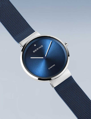 Angle shot of Bering 14531-309 Blue Dial Silver Stainless Steel Womens Watch on white background