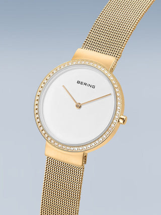 Angle shot of Bering 14531-330 White Dial Gold Stainless Steel Womens Watch on white background