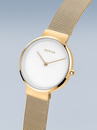 Angle shot of Bering 14531-334 White Dial Gold Stainless Steel Womens Watch on white background