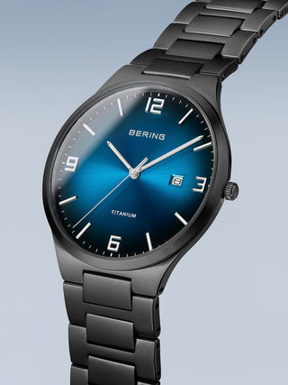 Angle shot of Bering 15240-727 Blue Dial Black Titanium Unisex Watch on white background