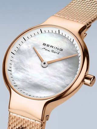 Angle shot of Bering 15527-364 Mother Of Pearl Dial Rose Gold Stainless Steel Womens Watch on white background