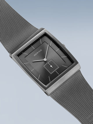 Angle shot of Bering 16033-377 Grey Stainless Steel Unisex Watch on white background