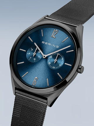 Angle shot of Bering 17140-227 Blue Dial Black Stainless Steel Unisex Watch on white background