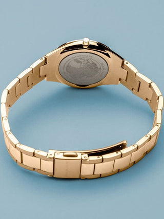 Angle shot of Bering 17231-734 White Dial Gold Stainless Steel Womens Watch on white background