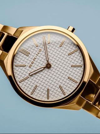 Angle shot of Bering 17231-734 White Dial Gold Stainless Steel Womens Watch on white background