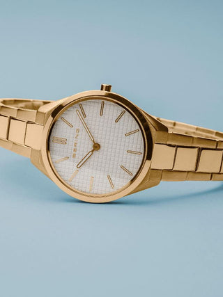 Angle shot of Bering 17231-734 White Dial Gold Stainless Steel Womens Watch on white background