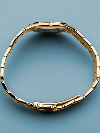 Angle shot of Bering 17231-734 White Dial Gold Stainless Steel Womens Watch on white background
