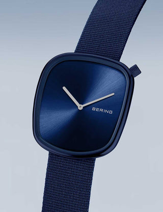 Angle shot of Bering 18040-397 Blue Textile Unisex Watch on white background