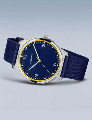 Angle shot of Bering 18342-507 Blue Textile Unisex Watch on white background