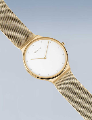 Angle shot of Bering 18440-334 White Dial Gold Stainless Steel Unisex Watch on white background