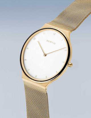 Angle shot of Bering 18440-334 White Dial Gold Stainless Steel Unisex Watch on white background