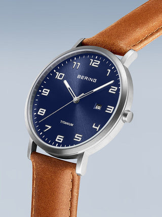 Angle shot of Bering 18640-567 Blue Dial Brown Leather Unisex Watch on white background