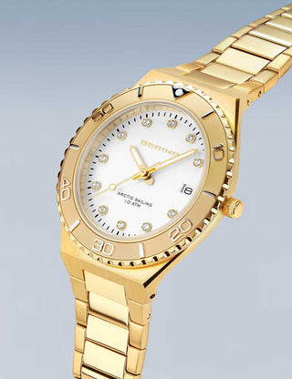 Angle shot of Bering 18936-734 White Dial Gold Stainless Steel Womens Watch on white background