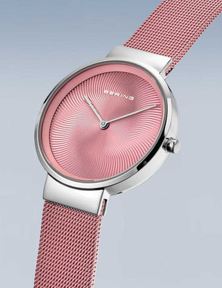 Angle shot of Bering 19031-989-GWP Pink Stainless Steel Womens Watch on white background