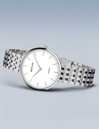 Angle shot of Bering 19334-004 White Dial Silver Titanium Womens Watch on white background