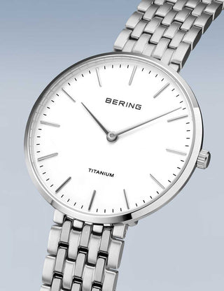 Angle shot of Bering 19334-004 White Dial Silver Titanium Womens Watch on white background