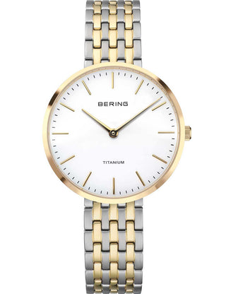 Front view of Bering 19334-010 White Dial Gold Titanium Womens Watch on white background