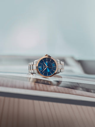 Angle shot of Victorinox 241911 Blue Dial Rose Gold Stainless Steel Unisex Watch on white background