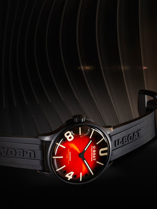 Angle shot of U-Boat 9501 Red Dial Black Strap Unisex Watch on white background