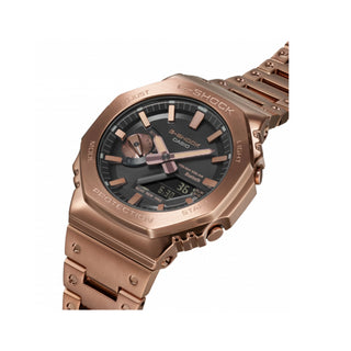 Angle shot of Casio G-Shock GM-B2100GD-5AER Black Dial Rose Gold Stainless Steel Mens Watch on white background