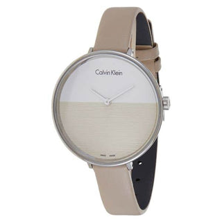 Front view of Calvin Klein Rise K7A231XH Beige Dial White Leather Womens Watch on white background