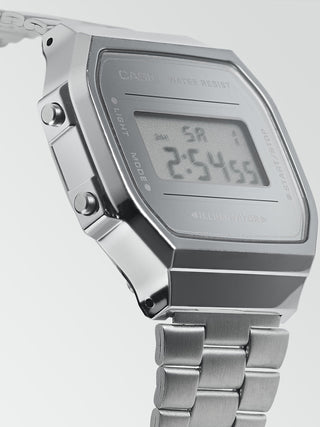 Angle shot of Casio Retro Vintage A168WEM-7EF Grey Stainless Steel Unisex Watch on white background