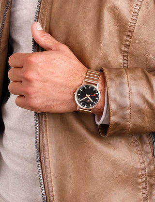 Angle shot of Mondaine A660.30360.16SBR Black Dial Rose Gold Stainless Steel Unisex Watch on white background