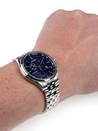 Angle shot of Citizen Chronograph AT2141-52L Blue Dial Silver Stainless Steel Unisex Watch on white background