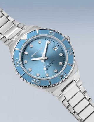 Angle shot of Bering 18936-705 Blue Dial Silver Stainless Steel Womens Watch on white background