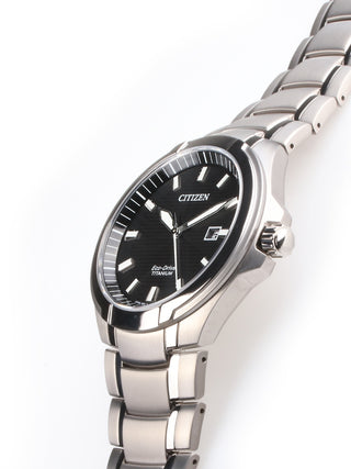 Angle shot of Citizen BM7430-89E Black Dial Silver Titanium Unisex Watch on white background