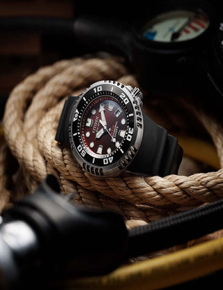 Angle shot of Citizen Chronograph BN1024-01Z Red Dial Black Silicone Unisex Watch on white background