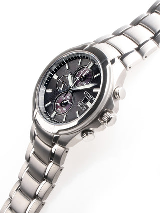 Angle shot of Citizen Chronograph CA0700-86E Black Dial Silver Titanium Unisex Watch on white background