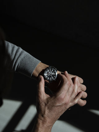 Angle shot of Casio Edifice ECB-2000D-1AEF Black Dial Grey Stainless Steel Mens Watch on white background