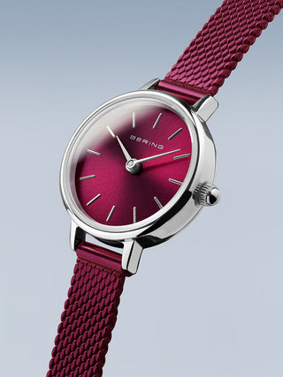 Angle shot of Bering 11022-909 Purple Stainless Steel Womens Watch on white background