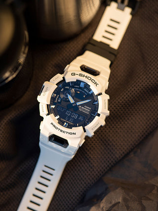 Angle shot of Casio G-Shock GBA-900-7AER Black Dial White Resin Mens Watch on white background