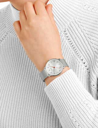 Angle shot of Mondaine MLE.33110.SM White Dial Silver Stainless Steel Womens Watch on white background