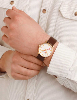 Angle shot of Mondaine MSE.40112.LGV Silver Dial Brown Leather Unisex Watch on white background