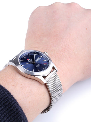 Angle shot of Swiss Military By Chrono SMP36040.03 Blue Dial Silver Stainless Steel Unisex Watch on white background